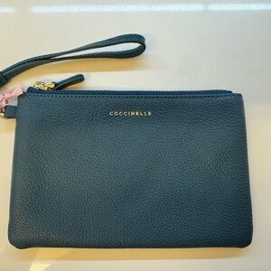 Coccinelle pochette in turquoise